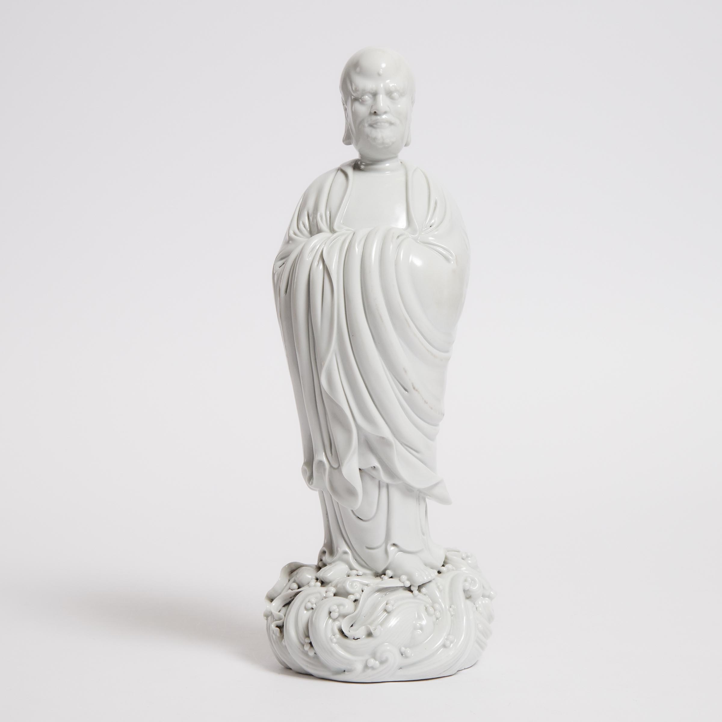 A Dehua Blanc de Chine Figure of