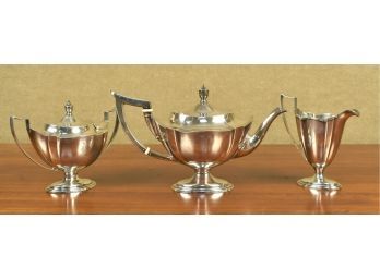 A delicate three piece sterling tea