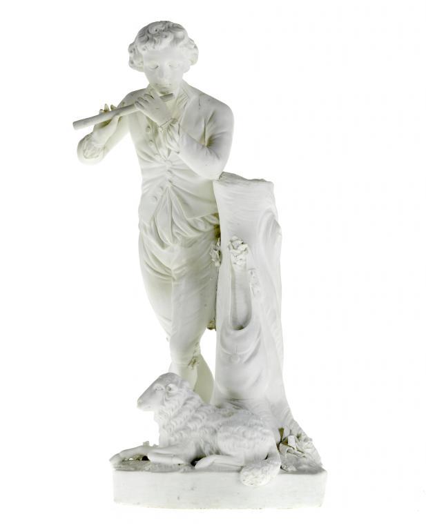 A DERBY BISCUIT FIGURE OF A
