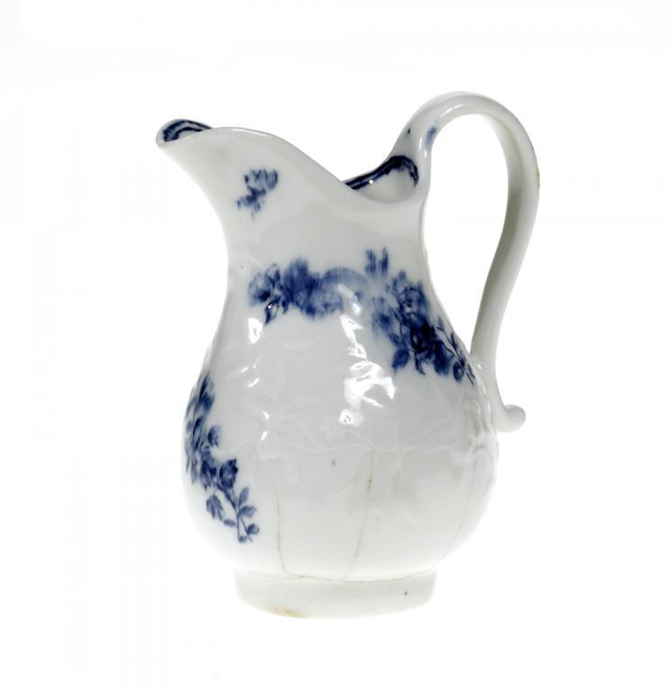 A DERBY CREAM JUG of baluster shape