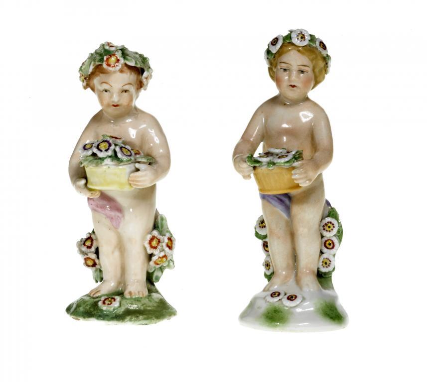 A DERBY FIGURE OF A CHILD naked