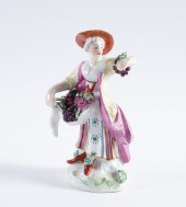 A DERBY FIGURE OF A WOMAN SELL