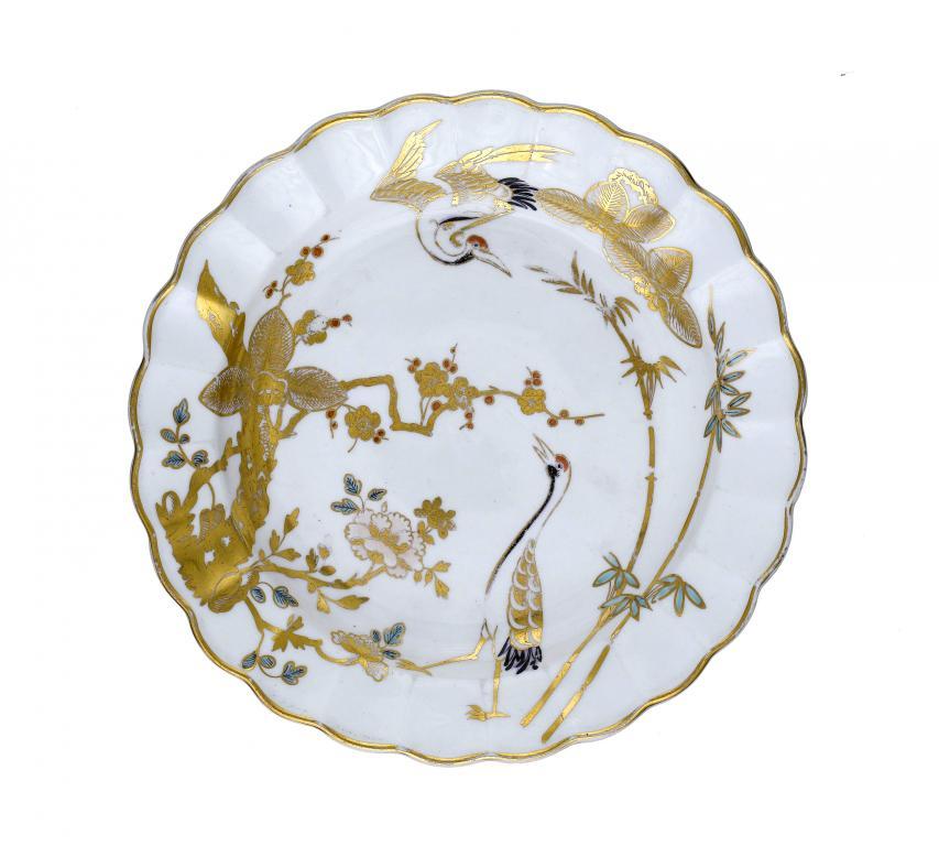 A DERBY FLUTED PLATE enamelled