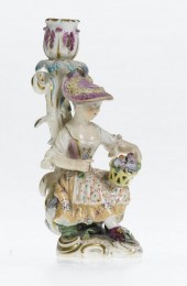 A DERBY GARDENER CANDLESTICK<b