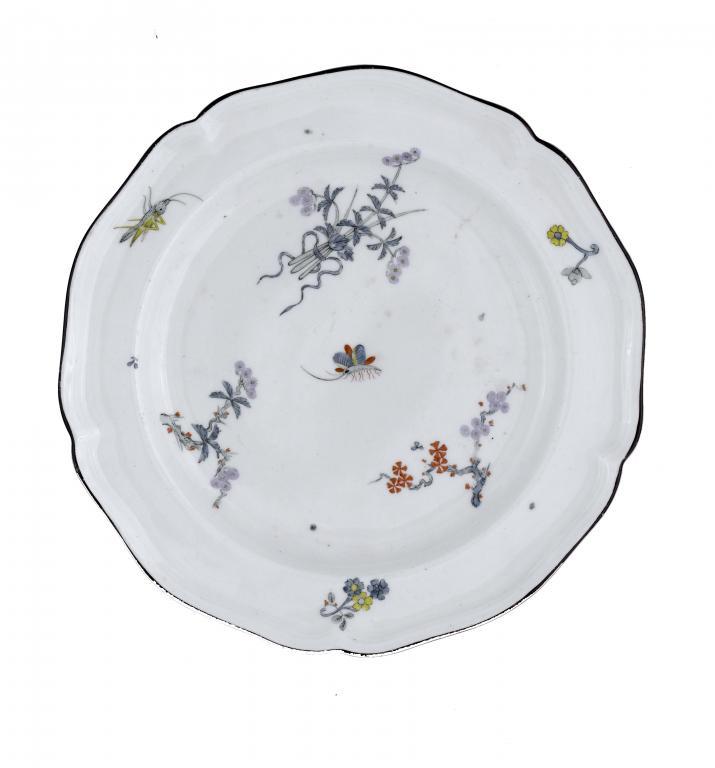 A DERBY PLATE after a Meissen