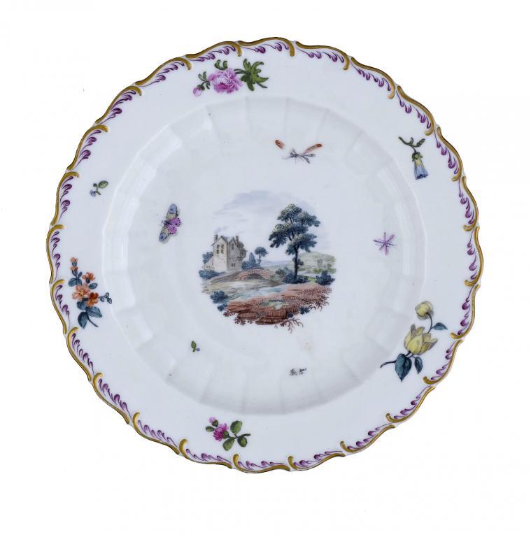 A DERBY PLATE painted in polychrome