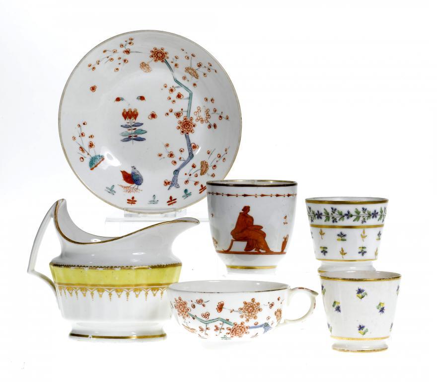 A DERBY TEA CUP AND SAUCER