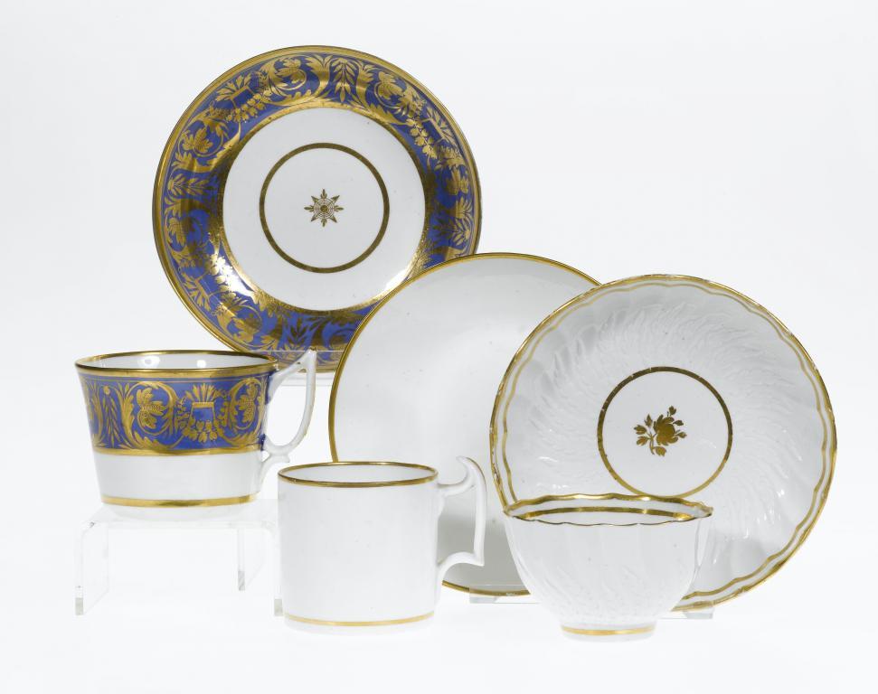 A DERBY TEACUP AND SAUCER with gilt