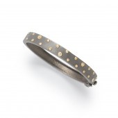 A DIAMOND AND BLACKENED SILVER