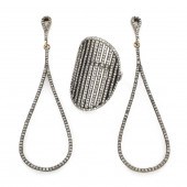 A DIAMOND AND BLACKENED SILVER