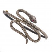 A DIAMOND AND BLACKENED STERLI