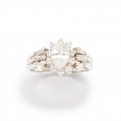 A DIAMOND AND EIGHTEEN KARAT W