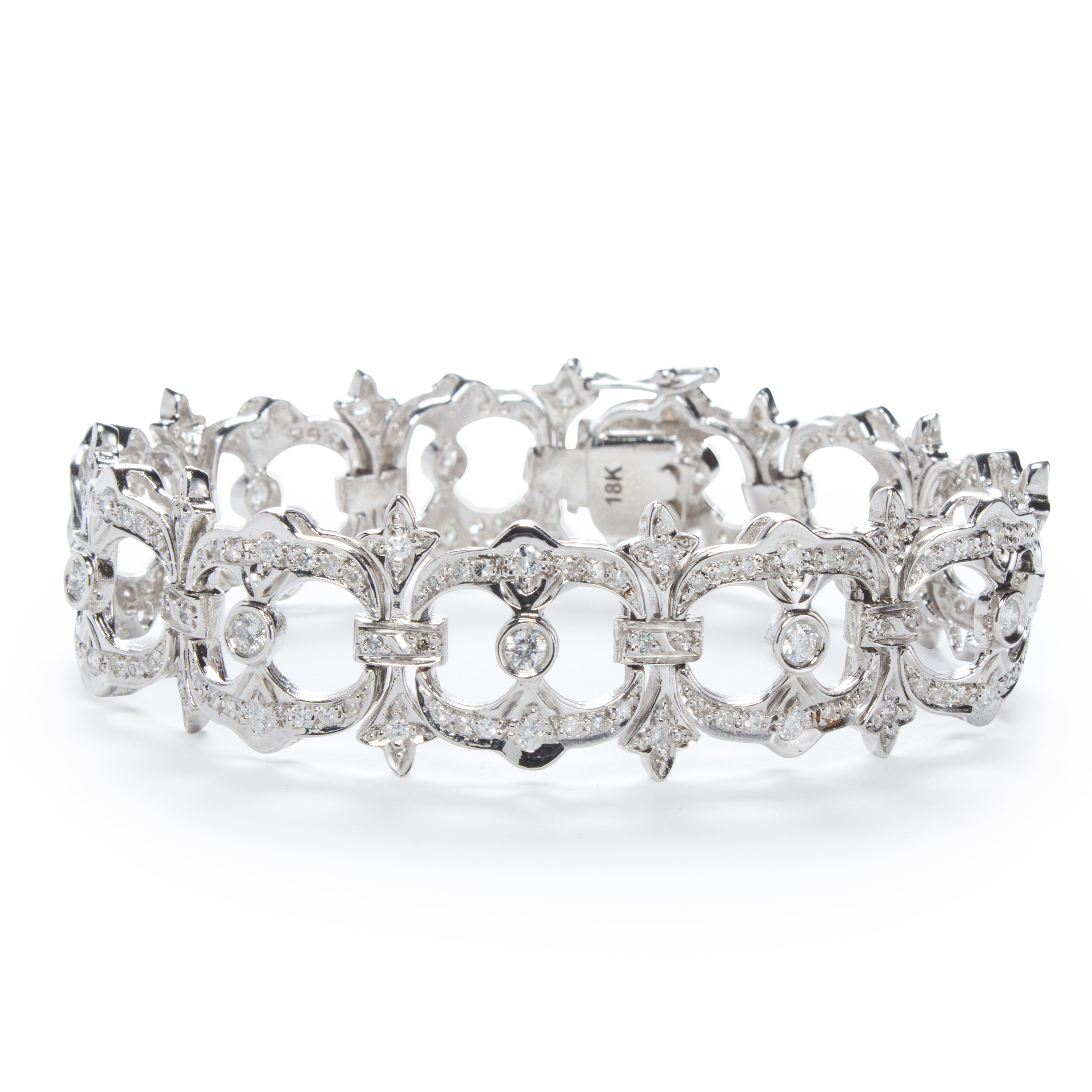 A DIAMOND AND EIGHTEEN KARAT