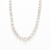 A DIAMOND AND EIGHTEEN KARAT G