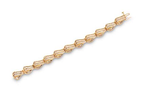 A DIAMOND AND FOURTEEN KARAT GOLD