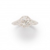 A DIAMOND AND FOURTEEN KARAT W