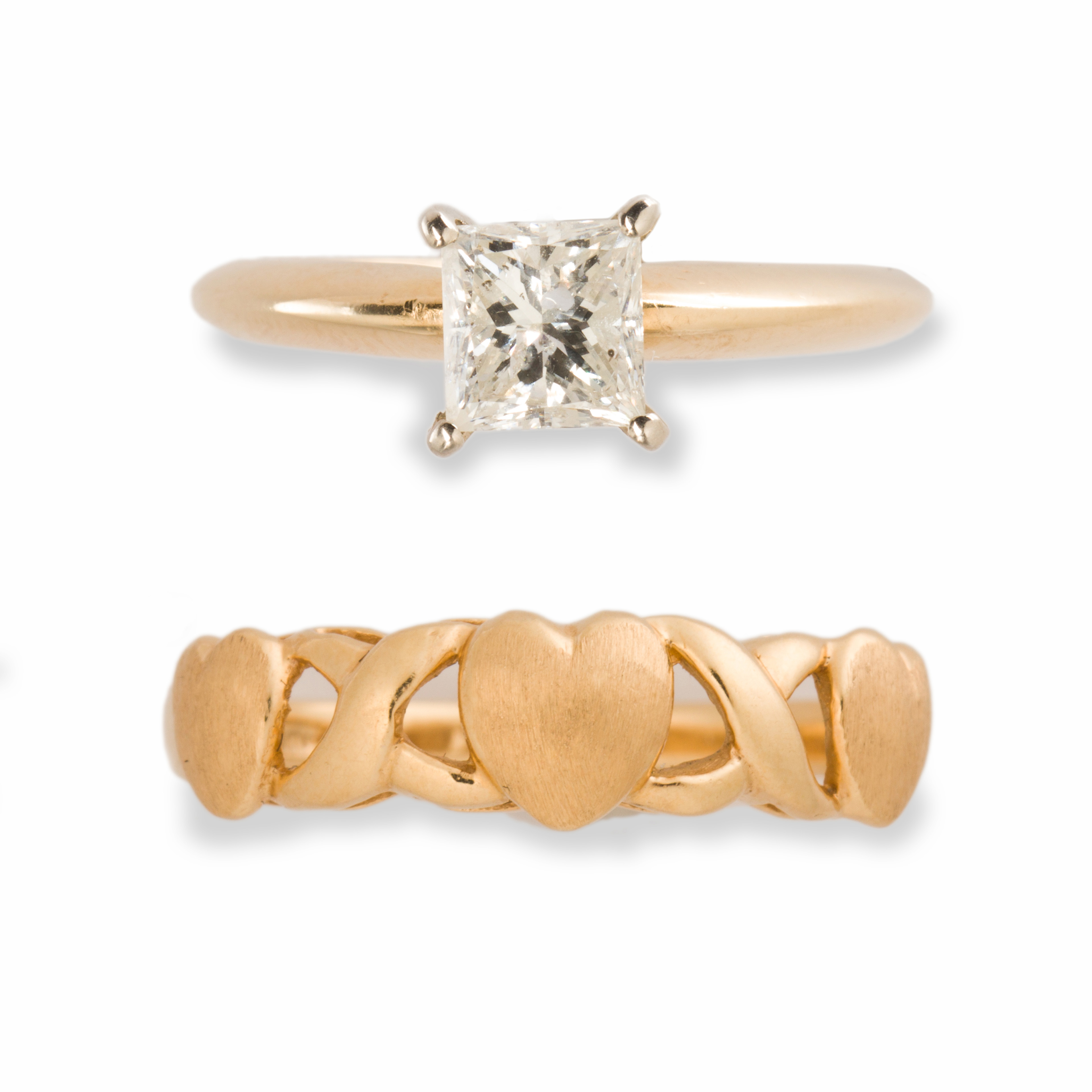 A DIAMOND AND FOURTEEN KARAT GOLD