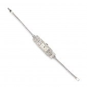 A DIAMOND AND PLATINUM DRESS W