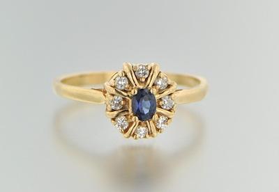 A Diamond and Sapphire Ring 14k