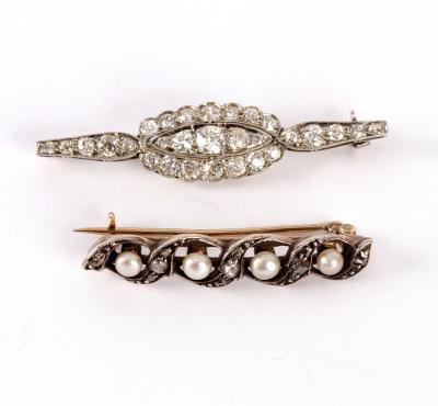 A diamond bar brooch, with