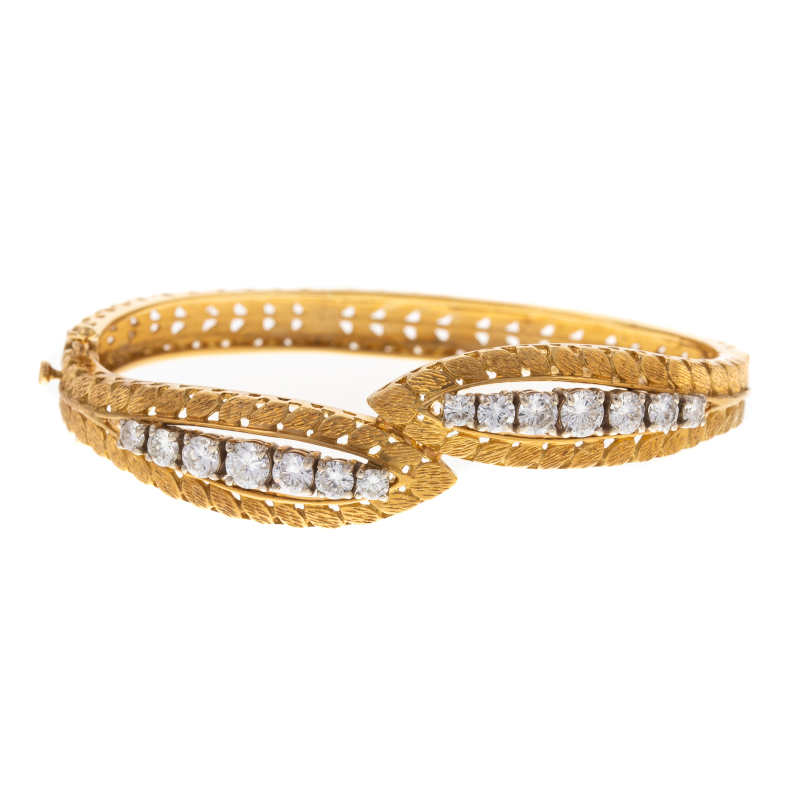 A DIAMOND BYPASS BANGLE BRACELET IN