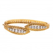 A DIAMOND BYPASS BANGLE BRACEL