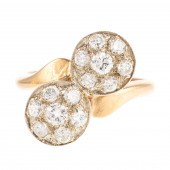 A DIAMOND BYPASS RING IN 14K 1