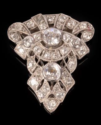 A diamond clip brooch of openwork