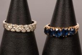 A diamond dress ring set in 18