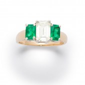 A DIAMOND, EMERALD AND FOURTEE