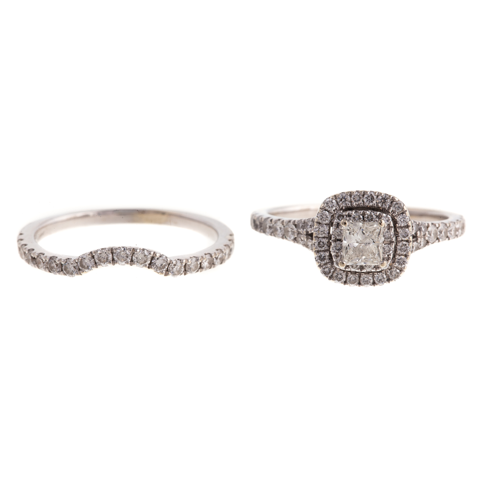 A DIAMOND ENGAGEMENT RING SET BY