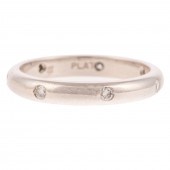 A DIAMOND ETERNITY BAND IN PLA
