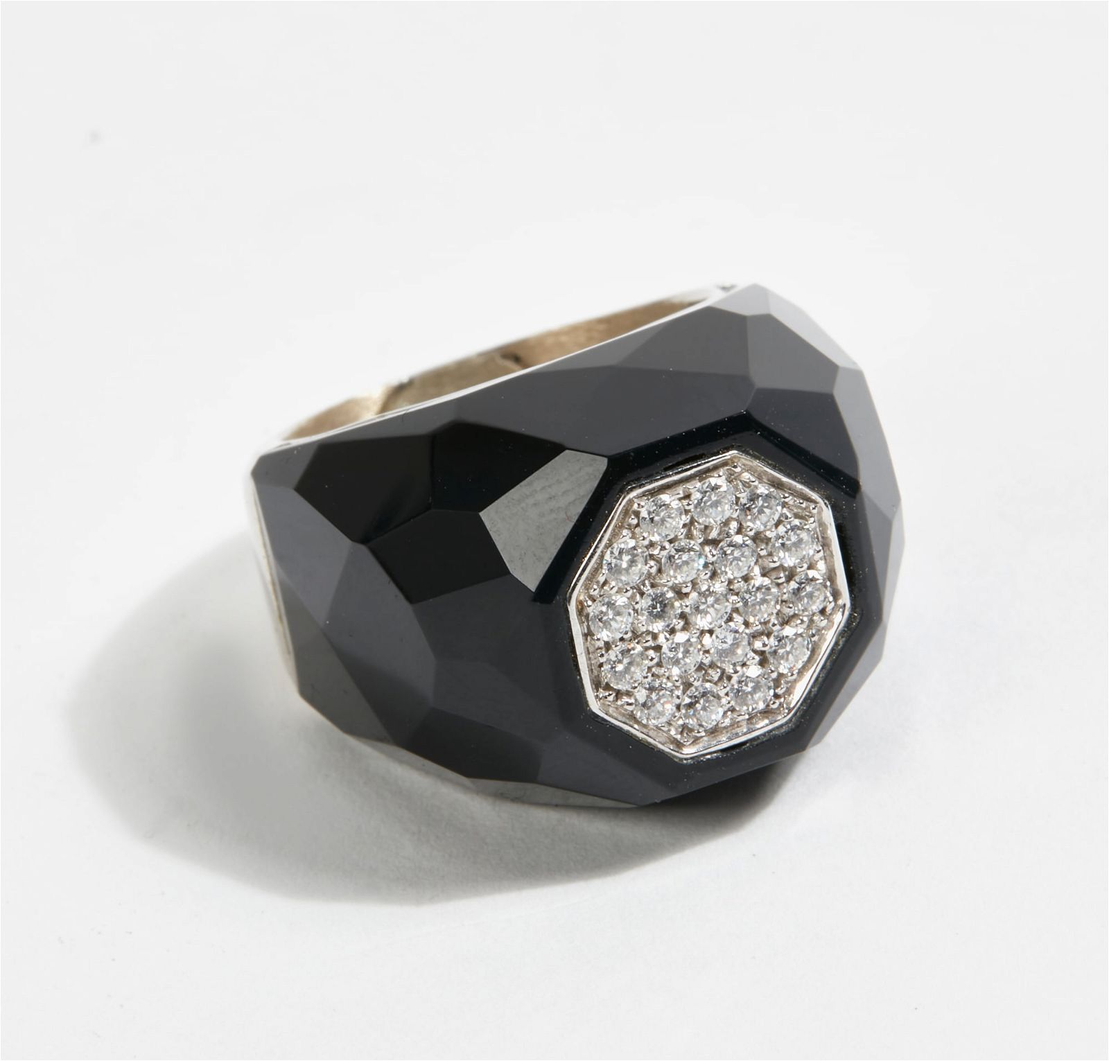 A DIAMOND, ONYX AND WHITE GOLD