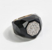 A DIAMOND, ONYX AND WHITE GOLD