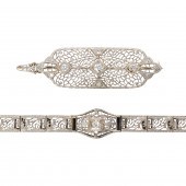 A DIAMOND, SAPPHIRE AND 14K WH