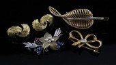 A diamond set 18ct gold bow br