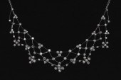A diamond set white gold open