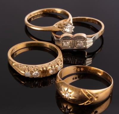 A diamond solitaire ring,