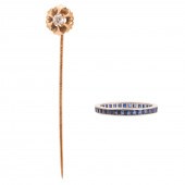 A DIAMOND STICK PIN WITH SAPPH