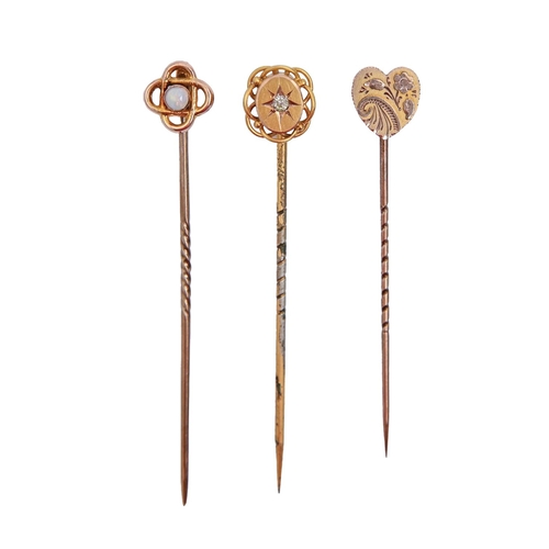 A diamond stickpin, an opal