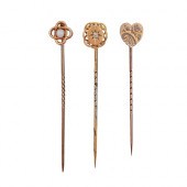 A diamond stickpin, an opal st