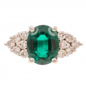 A DIAMOND & SYNTHETIC EMERALD