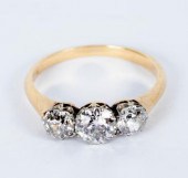 A diamond three-stone ring, th