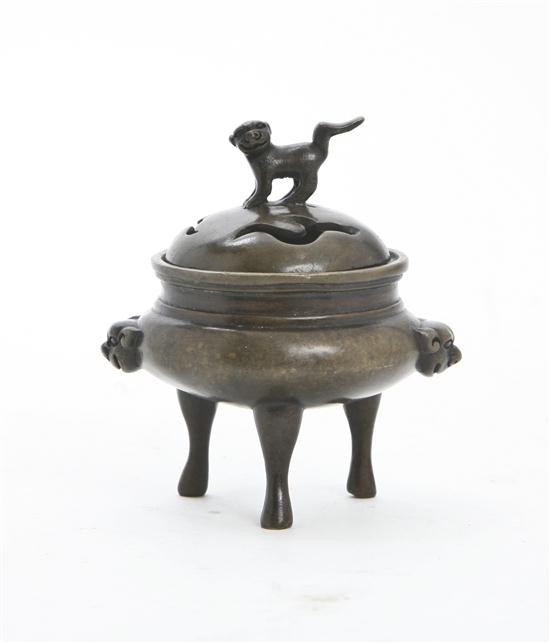 A Diminutive Bronze Covered