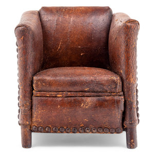 A Diminutive Leather Upholstered