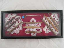 A display case 38 x 17cm containing