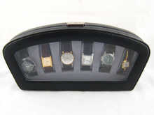 A display case containing five
