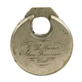 A D.K. MILLER ENGRAVED PADLOCK