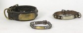 A dog collar with brass plaque
