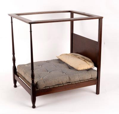 A dolls four poster bed, perhaps